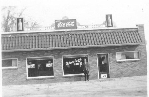 Black-and-white historical photo of the Standard Café, the original Sanborn restaurant on the site